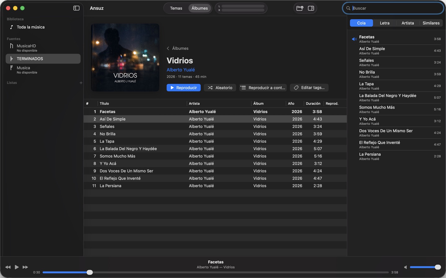 The album page, with the play queue in the side panel.